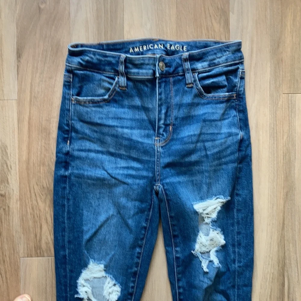 American Eagle next level stretch distressed hi rise jegging size 4 regular